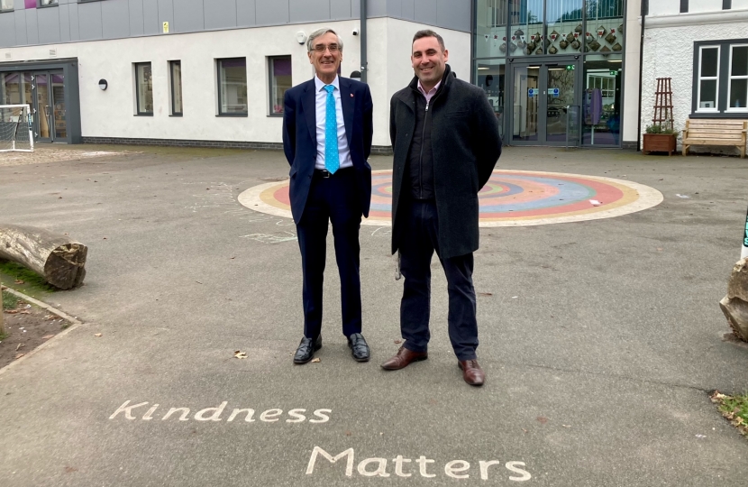 John Redwood and headteacher outside school