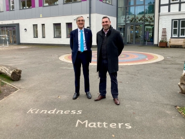 John Redwood and headteacher outside school